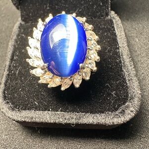 Elegant Blue Cabochon and Crystal Halo Ring